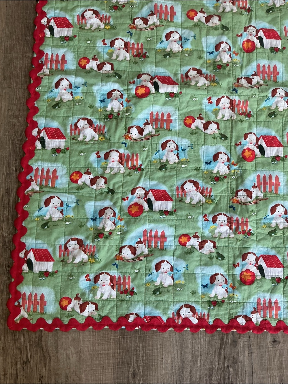 Cute handmade Puppy Print Baby Quilt with Red Ric Rac Trim